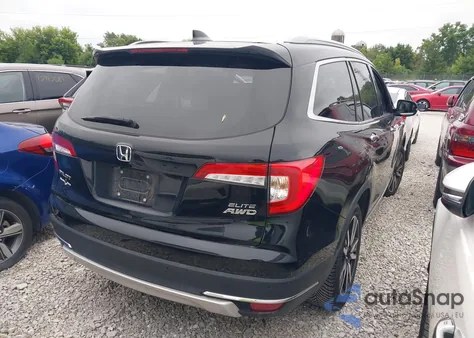 2021 Honda Pilot Awd Elite from USA, damaged, VIN 5FNYF6H01MB036750